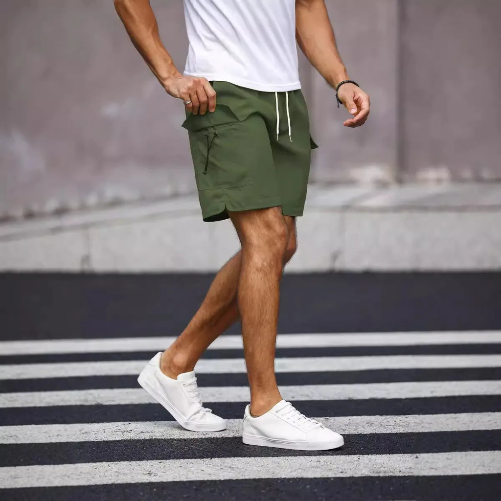 Men's loose fit work shorts in fluorescent green and army green colours with straight cut design