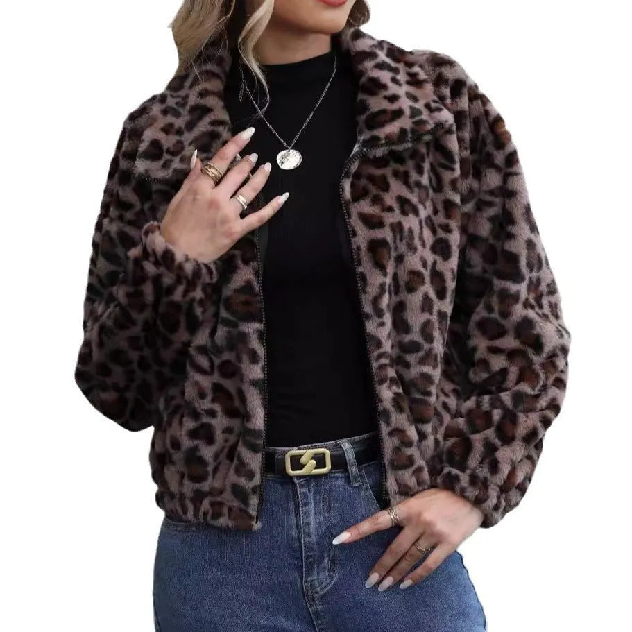 Women's loose leopard print plush coat with front zipper and raglan sleeves on a hanger.