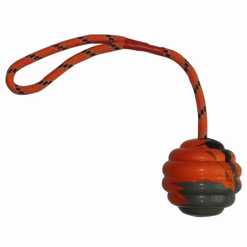 Rubber dog chew ball with rope knots measuring 6x30cm in multiple colour options