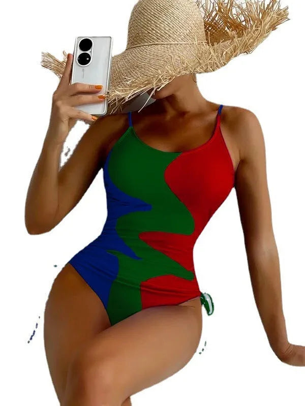 Women's sleeveless backless one-piece swimsuit in nylon spandex fabric available in blue, purple, brown, green colours