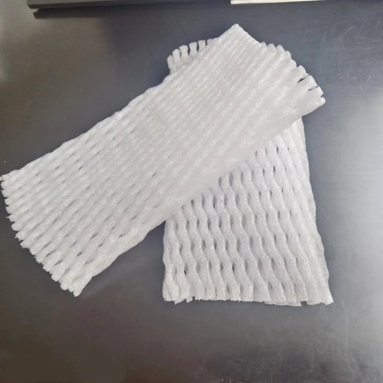 Ordinary white foam net protective case shown in various sizes for delicate items.