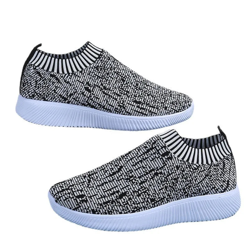 Unisex stripe knit sock shoes in white with low-top design and EVA sole for running and walking