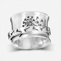 Silver electroplated rotatable flower ring showing floral design on alloy band