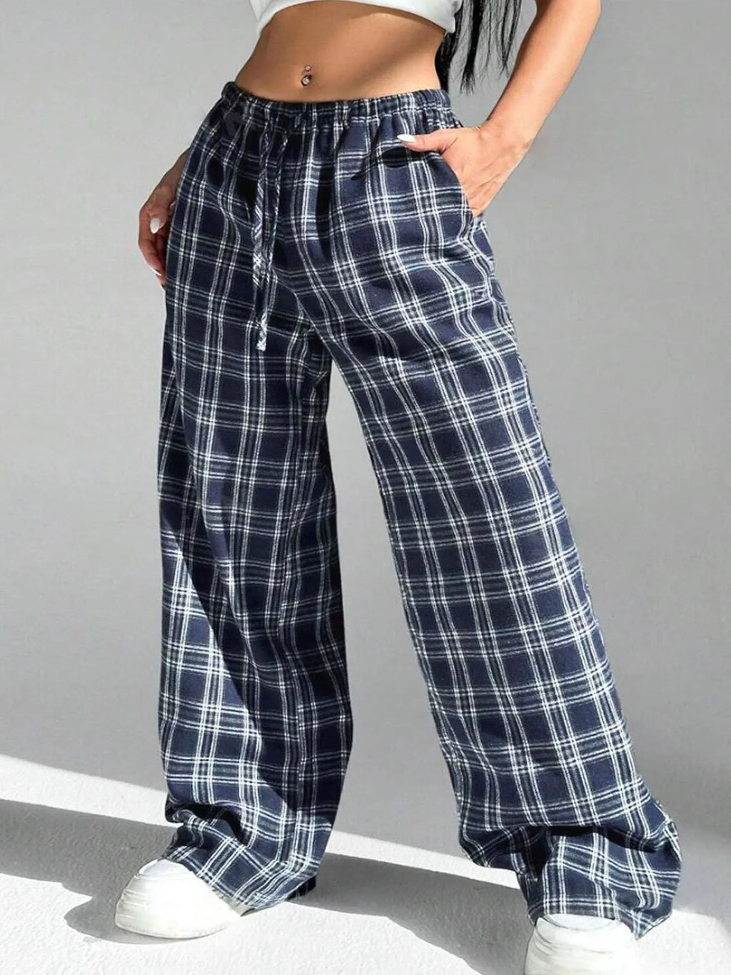 Women's casual loose fit trousers with drawstring waist and plaid pattern in red colour