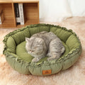 Reversible donut cat bed in grey or green available in three sizes for indoor pets