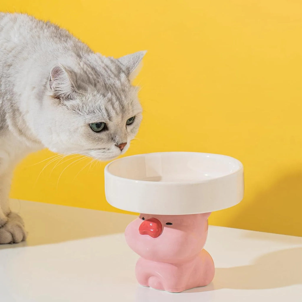 Raised ceramic cat bowl with animal design for elevated feeding