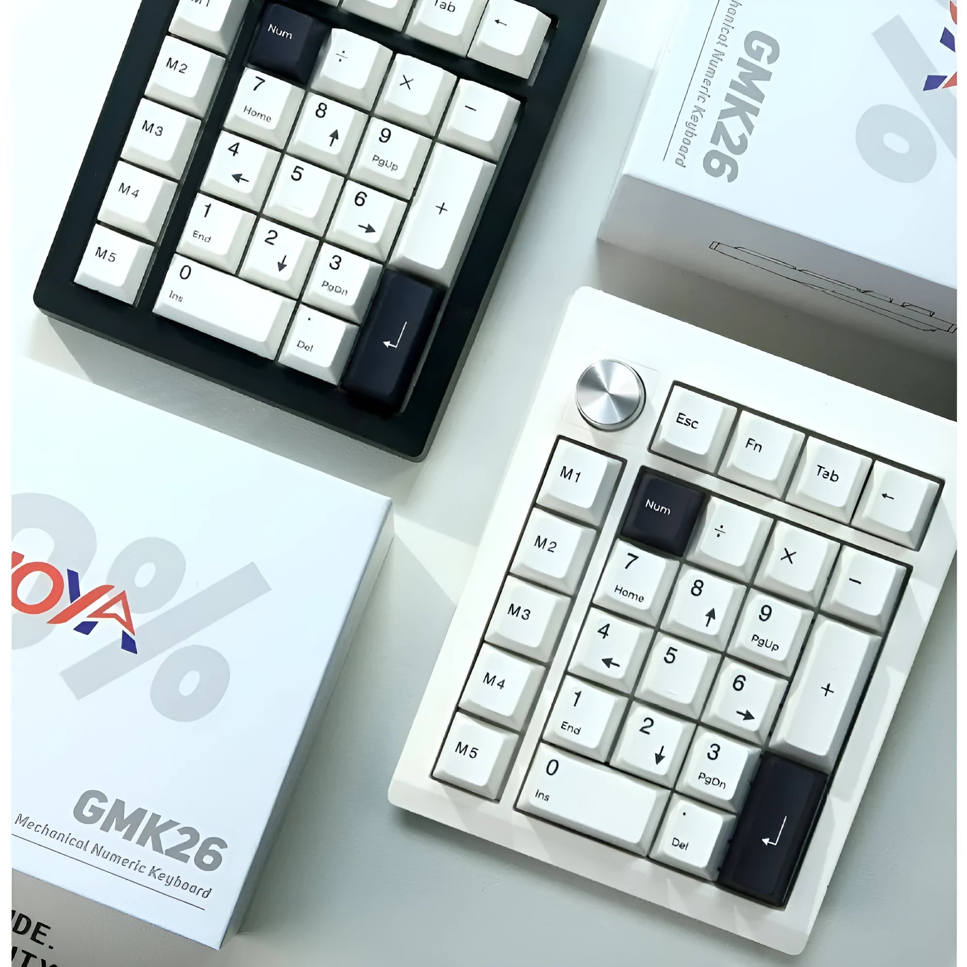 Black and white wireless Bluetooth mechanical numeric keyboard on a desk.