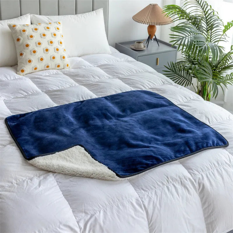 Lambswool waterproof pet blanket duvet in gray 75x100cm on a sofa