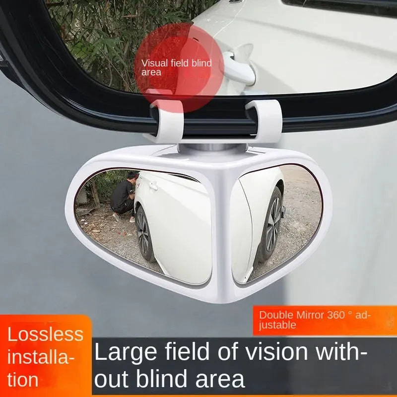 Car reversing small round wide-angle auxiliary mirror with adjustable ball joint, black, on a silver car side mirror