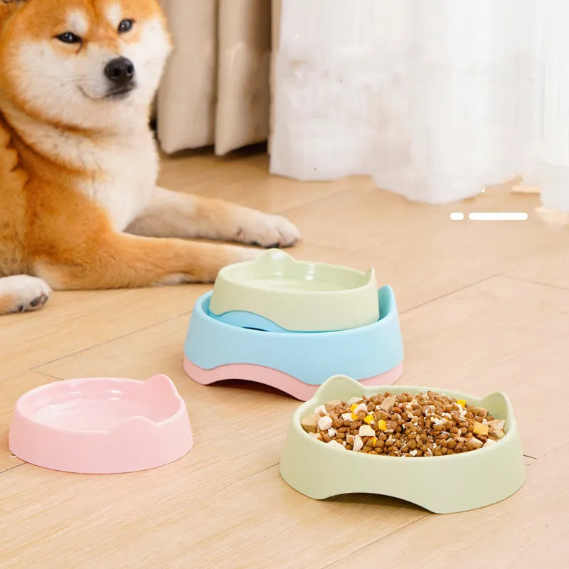 Blue ceramic dog slow feeder bowl with raised internal maze pattern for portion control
