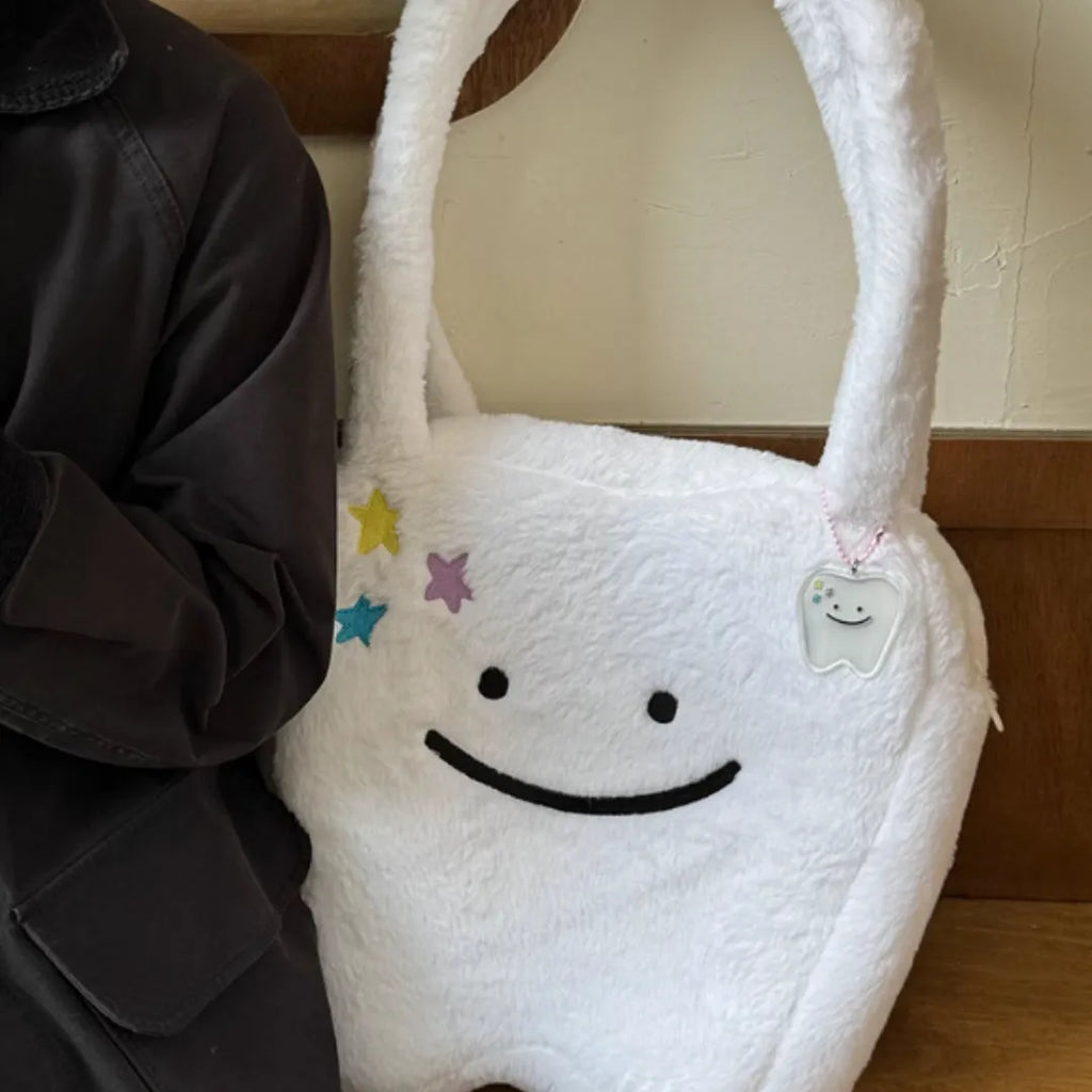 White plush shoulder tote bag with cute teeth pattern decoration and crossbody strap