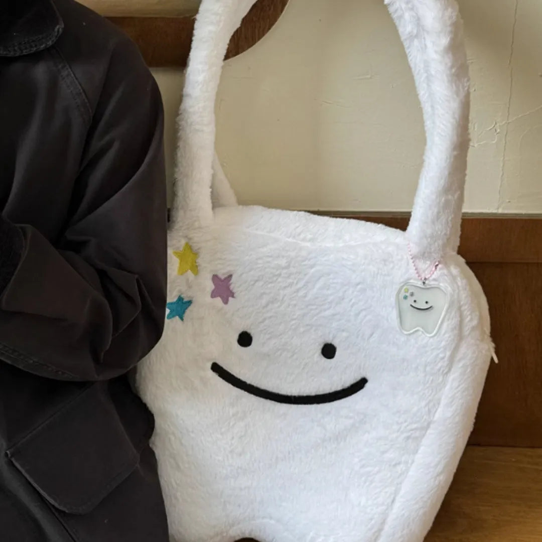 White plush shoulder tote bag with cute teeth pattern decoration and crossbody strap
