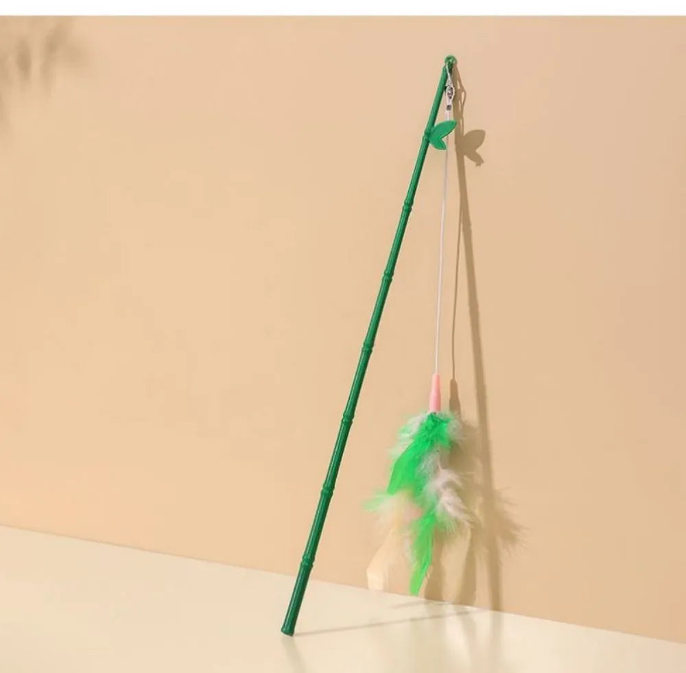 Green interactive cat feather wand with bells and feathers, durable play toy