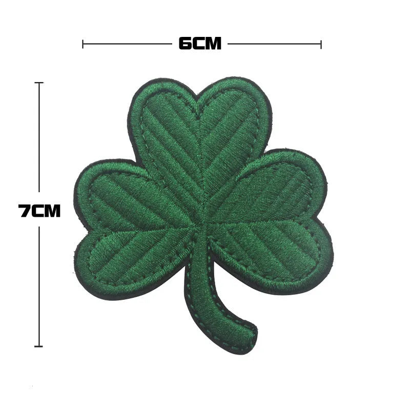 Outdoor embroidered fabric badge with velcro strip backing in green colour options.