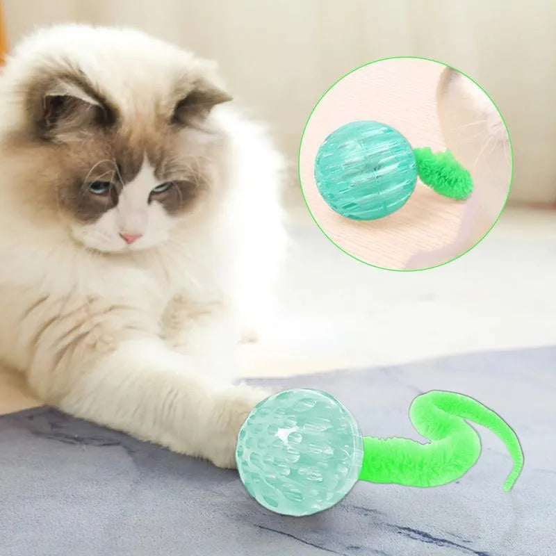 Interactive cat ball toy with worm tail in green on light background