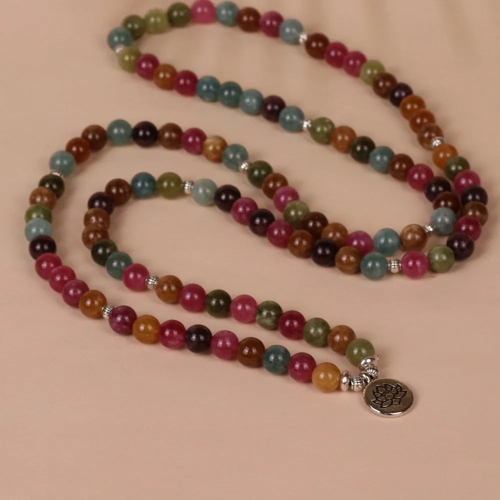 Multi-strand tourmaline bead bracelet with lotus clasp showing 108 beads on alloy chain