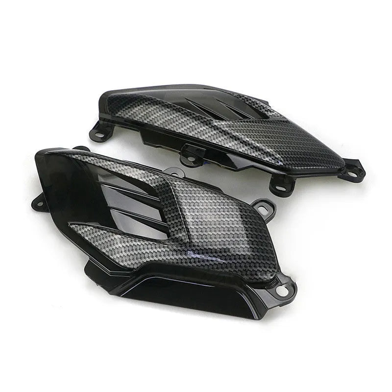 Pair of YAMAHA NMAX motorcycle LED side lamps with ABS shell on a white background
