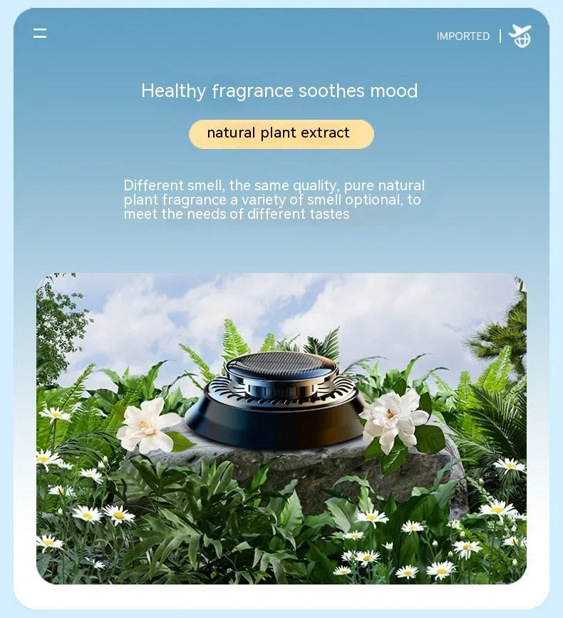Solar-powered kinetic car air freshener with rotating black double rings on a dashboard