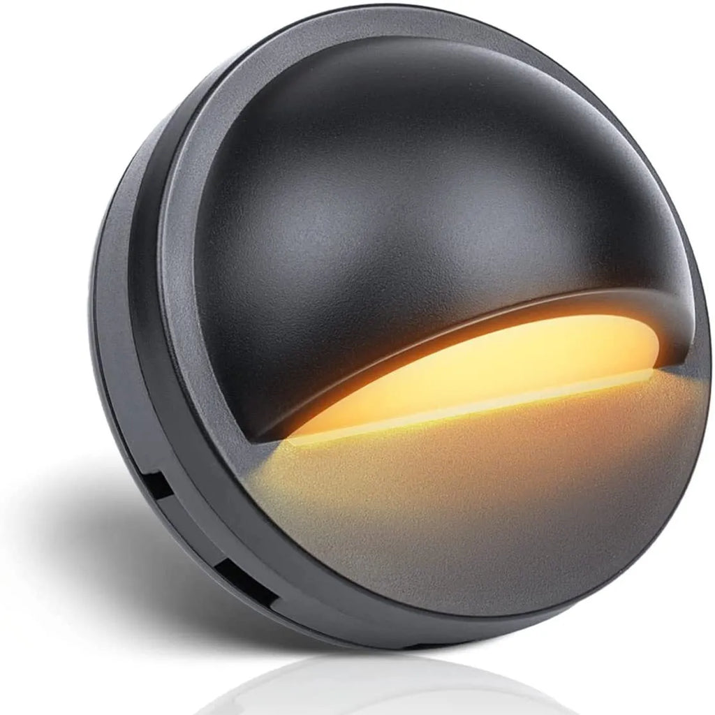 Compact low voltage outdoor step light with IP67 rating for garden paths