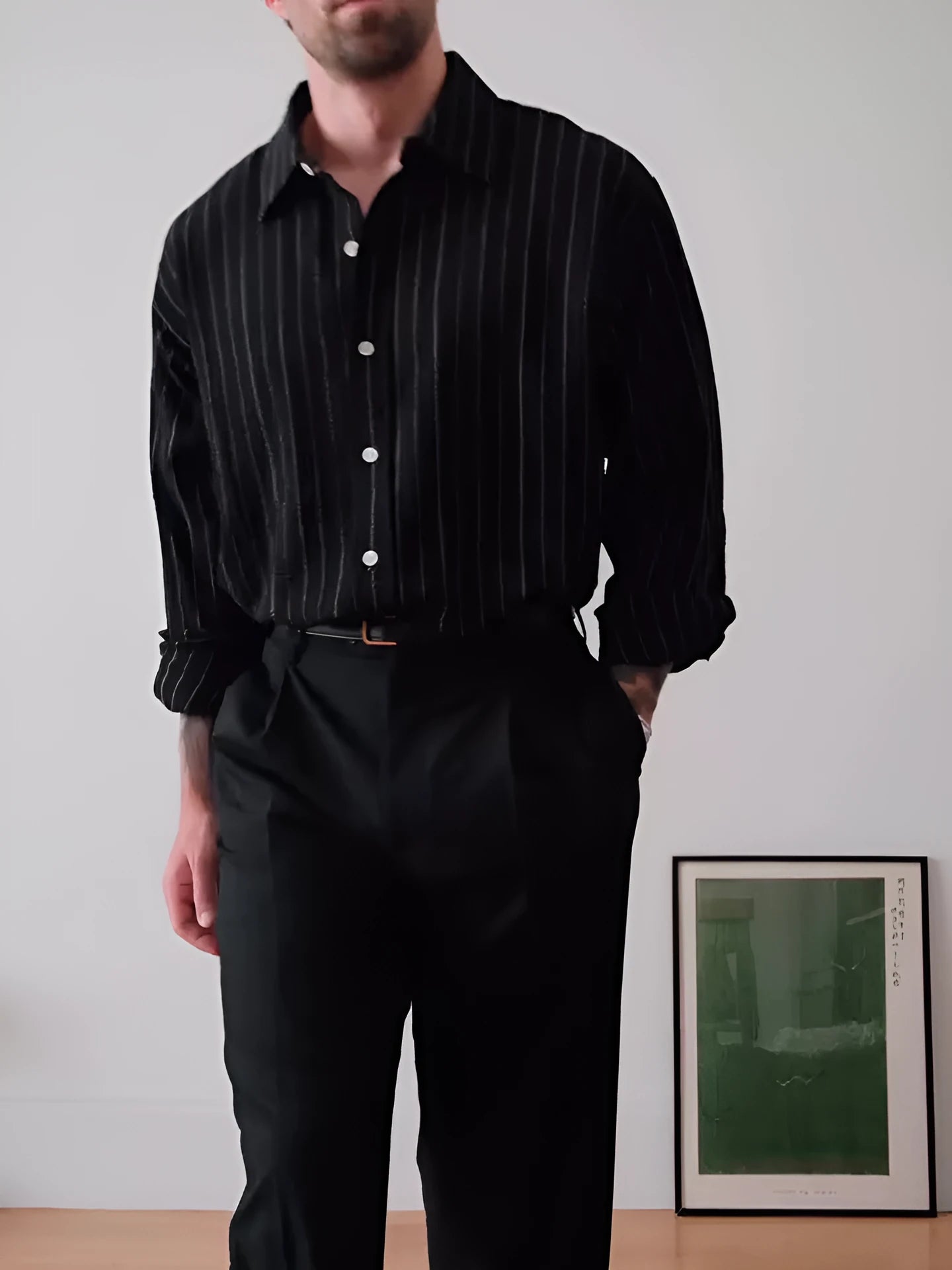 Men's black pinstripe polyester button-down shirt with regular fit on a hanger.