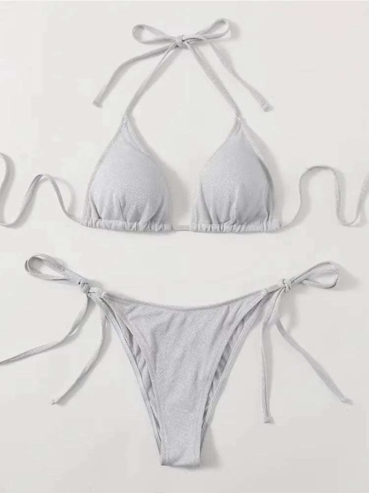 Women's split bandage bikini swimsuit in polyester fabric showing colour options and size range