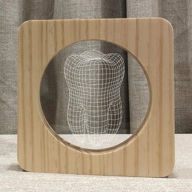 Wood colour tooth-shaped acrylic night lamp measuring 190x190x30mm with USB cable