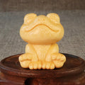 Solid bamboo smiling frog carving ornament measuring 5cm height with cartoon design