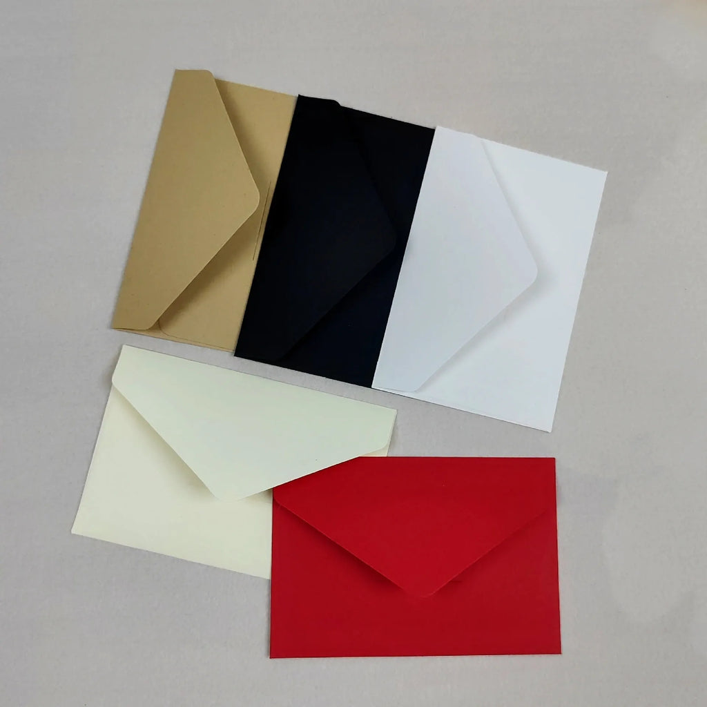 Pack of 100 kraft paper mini envelopes in beige, black, light brown, red, and white