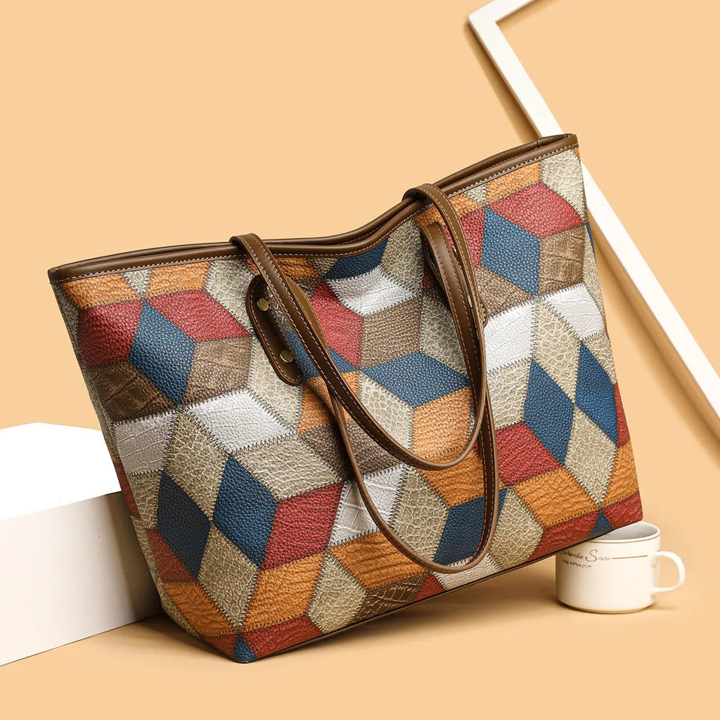 Women's blue brown PVC shoulder handbag with sandwich pocket design showing organised compartments