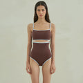 Brown women's one-piece swimsuit with triangle bust style on a mannequin.