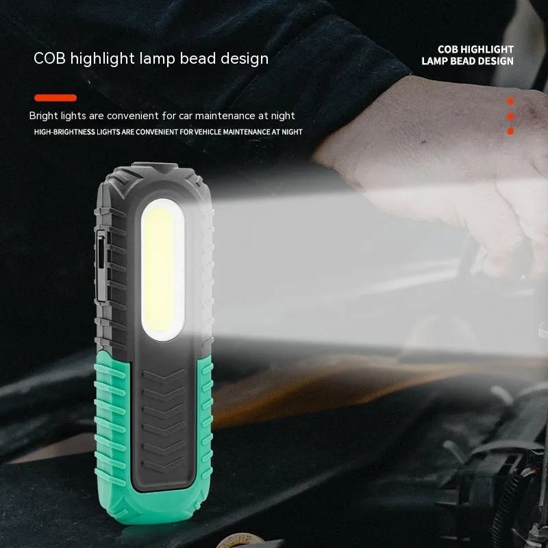 Black and green auto repair work light with USB charging port and 6500K white light for vehicle maintenance