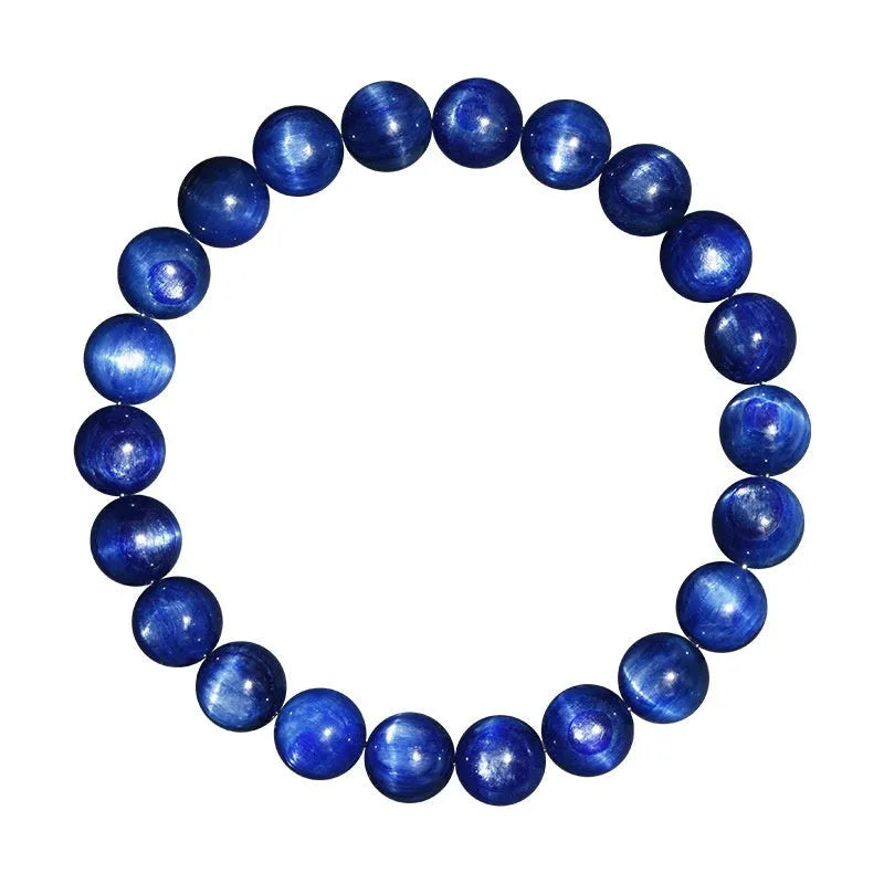 Polished blue crystal bracelet with geometric shapes and ruyi design elements on wrist