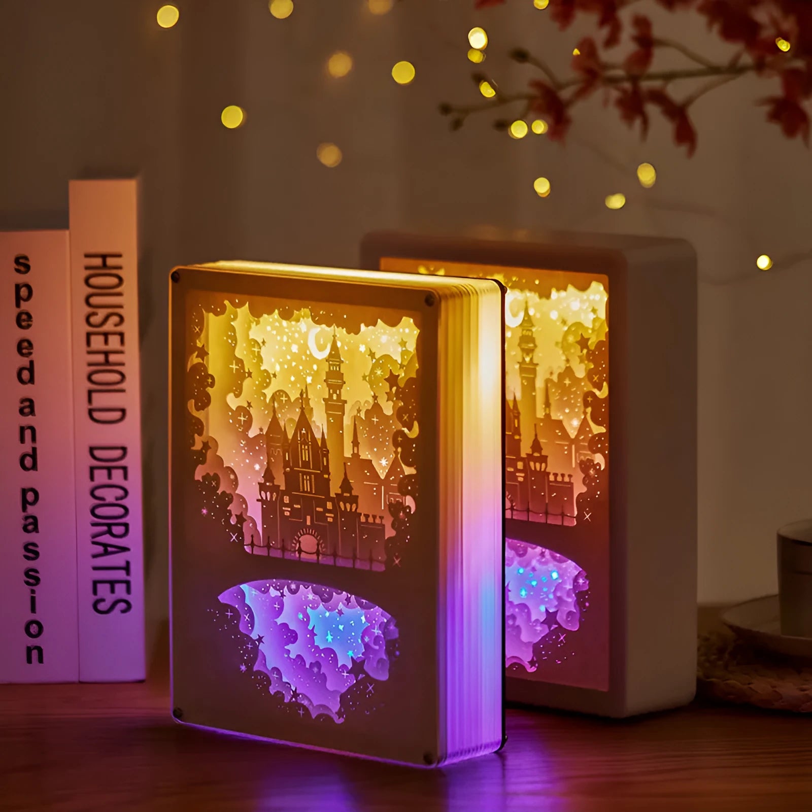 Modern bedside night light with paper carving design and remote control on wooden table