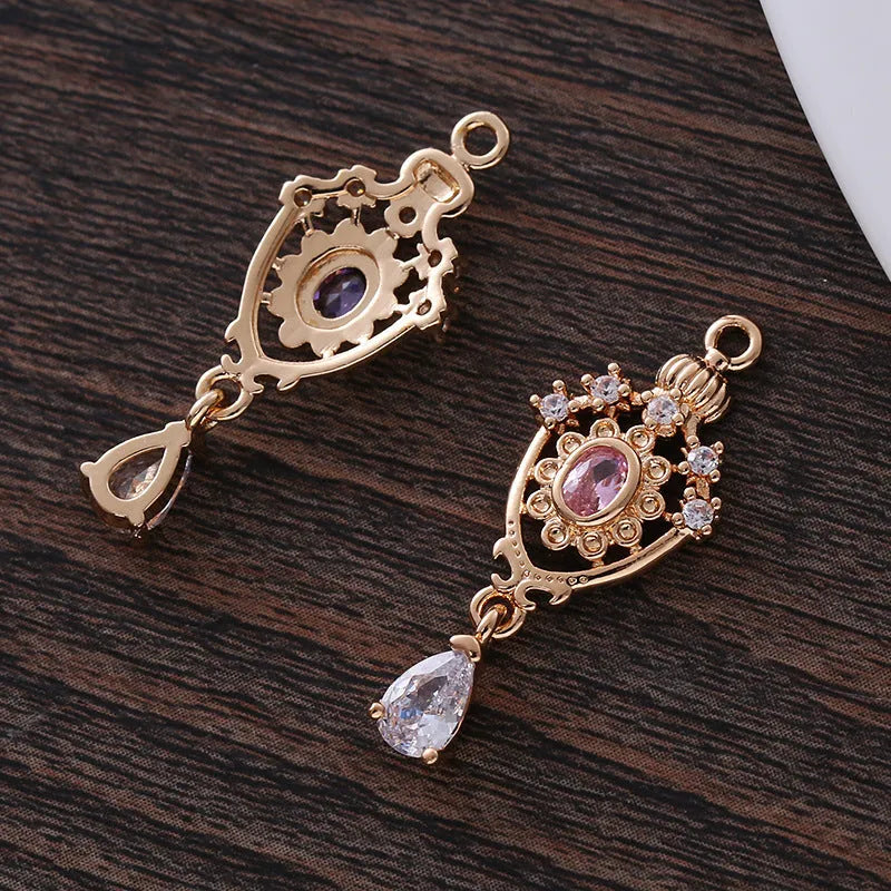 Water drop shaped copper pendant with micro inlaid zircon detail in choice of five colours.