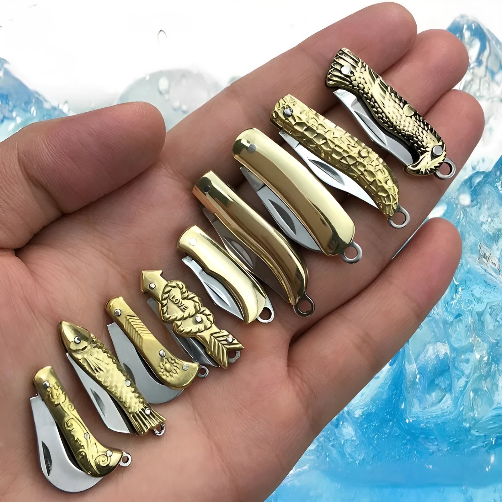 Brass mini folding knife with 3cm blade and keychain pendant on brass ring, 50mm full length model shown