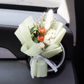 Handmade dried flower bouquet car vent clip air freshener in various colours.