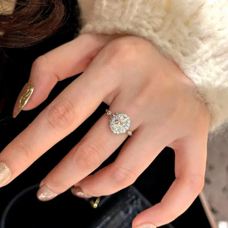 Silver colour geometric ring with adjustable opening and diamond detailing