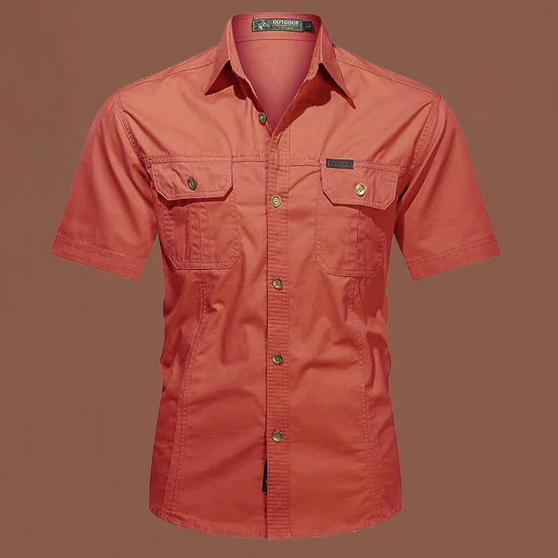 Men's short sleeve cotton work shirt in a loose cardigan style, shown in one of eight available colours.