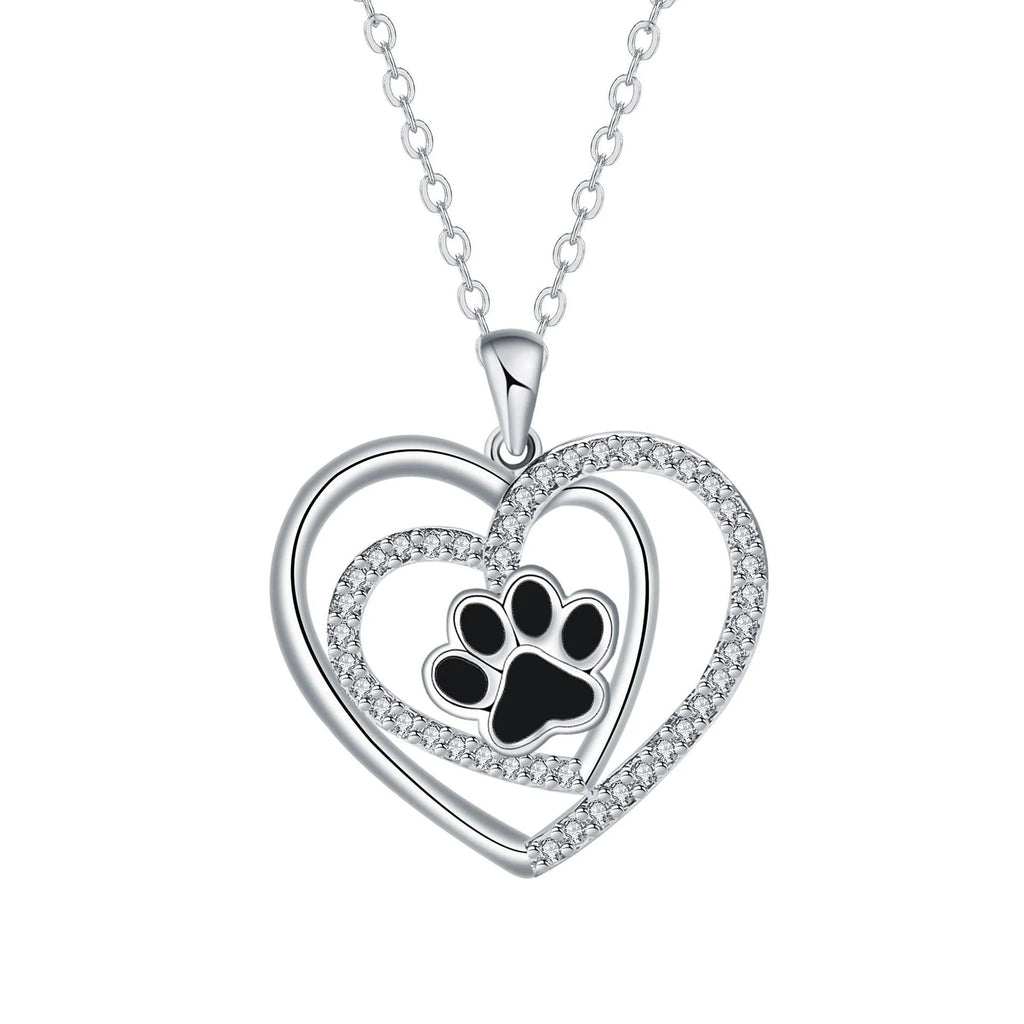 Electroplated copper necklace with heart-shaped dog paw print pendant on cross chain