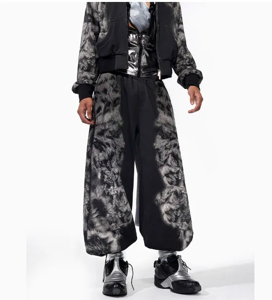 Street trendy printed loose three-piece clothing set showing trousers, hoodie, and seven-inch pants in polyester fabric.
