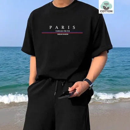 Men's loose fit pure cotton T-shirt with a printed letter design on the front, shown in apricot colour.