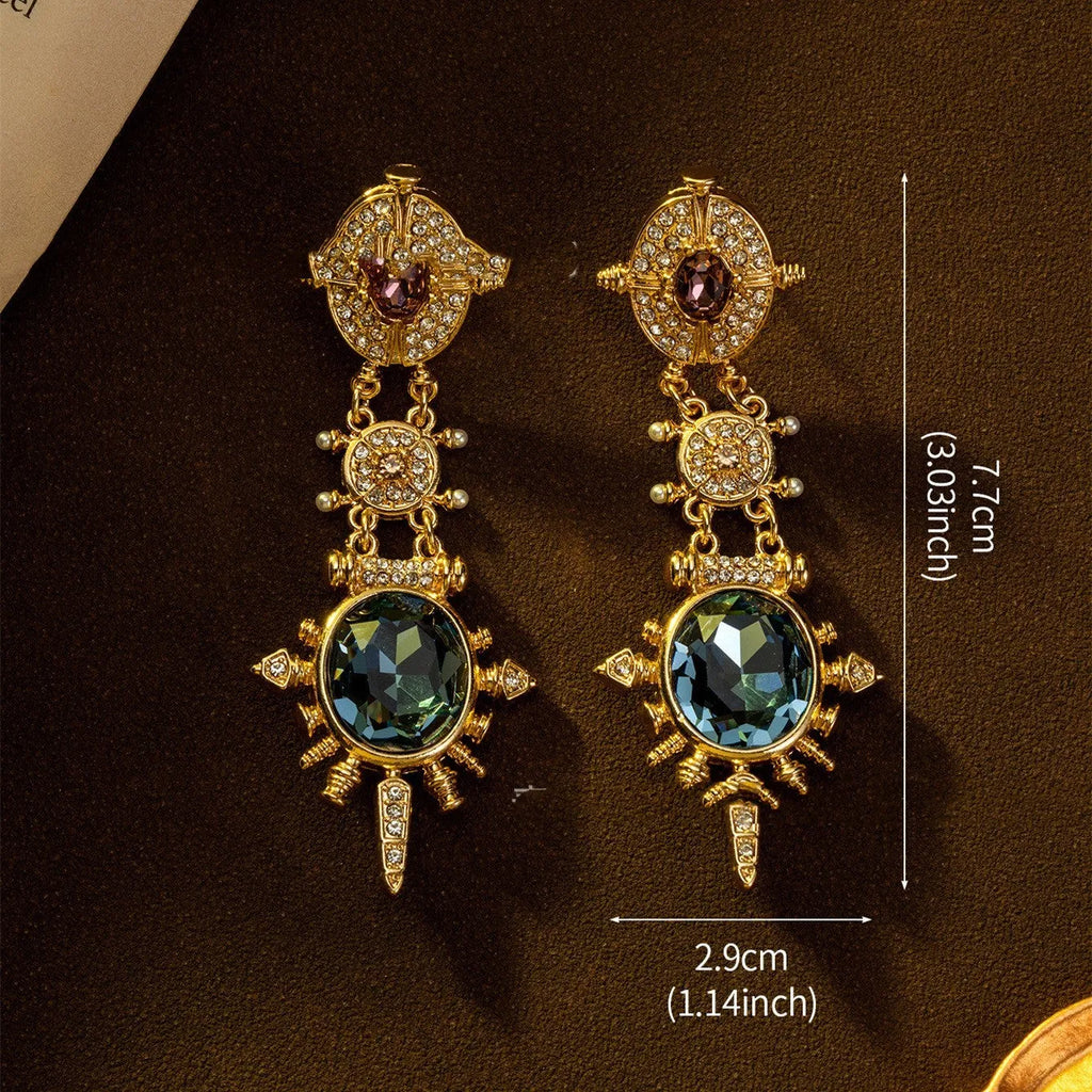 A pair of gold colour alloy stud earrings with geometric round shape in retro court style