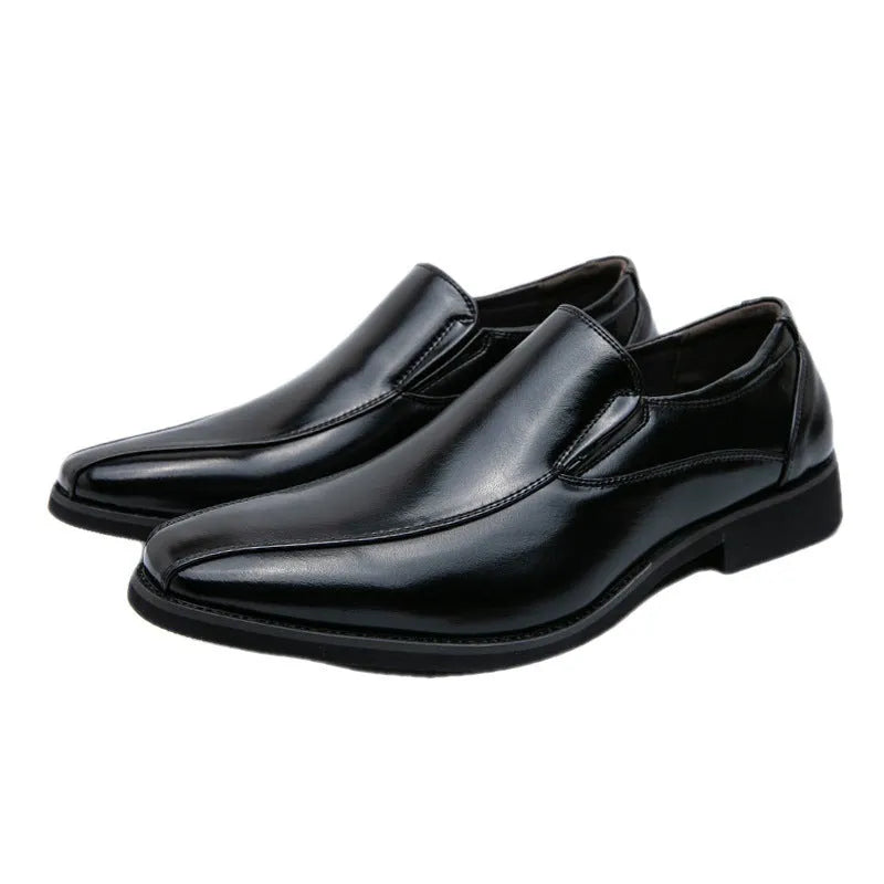 Men's black pointed patent leather shoes with leather lining and flat heel on a neutral background