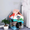Foldable corrugated paper cat scratching board featuring a colourful Nagoya cat pattern design.