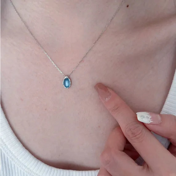 Navy blue water drop necklace with geometric pendant on cross chain, adjustable 41-50cm length