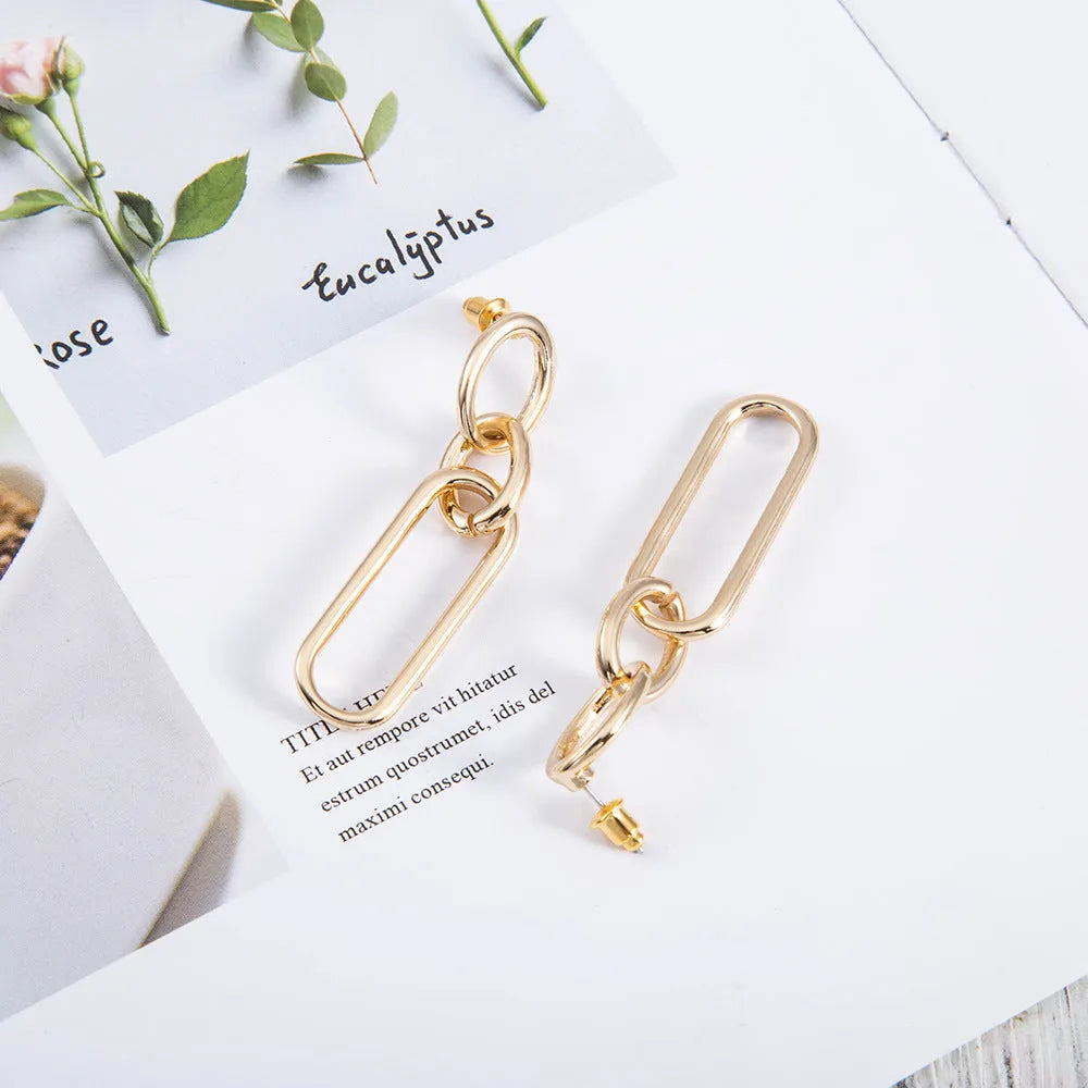 Geometric sterling silver needle hoop earrings with ring and line elements for women