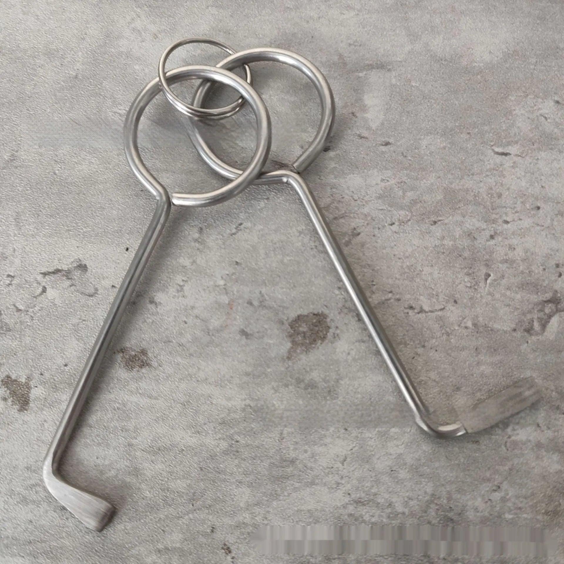 Two identical silver alloy steel adjustable wrench tools side by side.