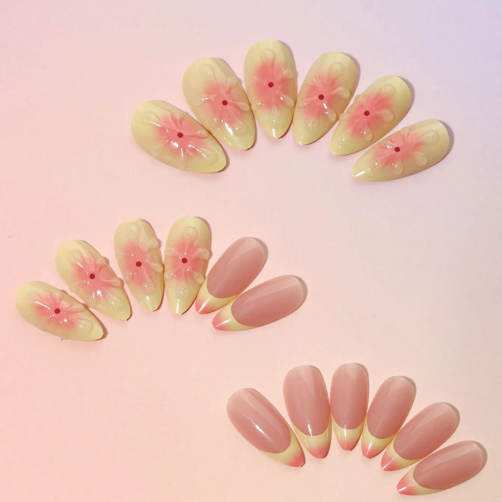 Set of detachable plastic fake nails with colourful 3D cartoon flower pattern, jelly glue pot, and filing strip.