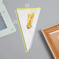 Clear triangle-shaped plastic packaging bag with a metallic twist tie at the top.