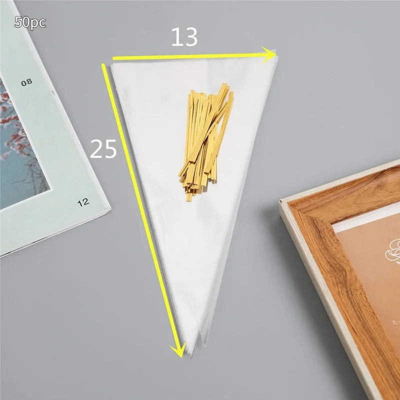 Clear triangle-shaped plastic packaging bag with a metallic twist tie at the top.